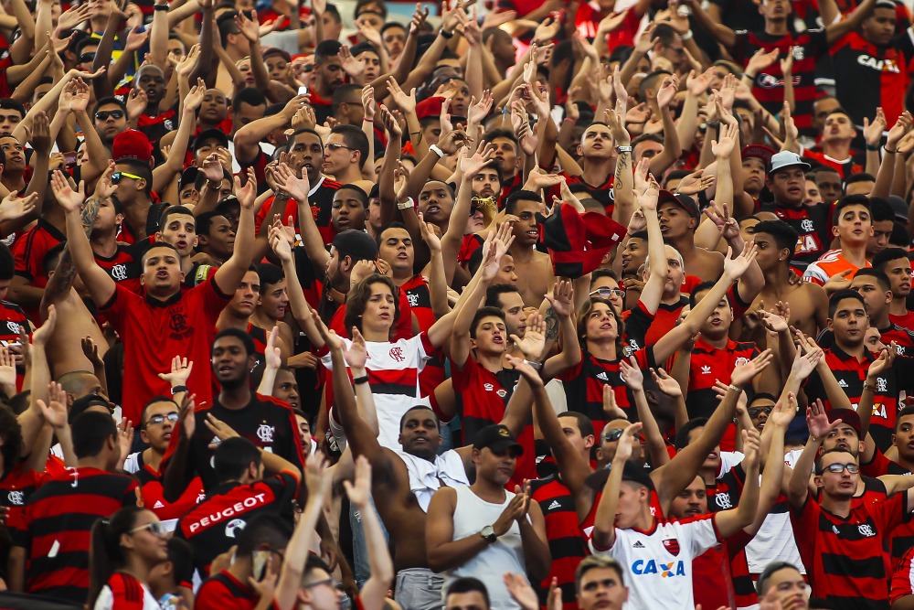 RIO DE JANEIRO, BRAZIL - AUGUST 23: Fans of Flamengo in action during the Brasileirao Series A 2015 match between Flamengo and Sao Paulo at Maracana Stadium on August 23, 2015 in Rio de Janeiro, Brazil. (Photo by Bruna Prado/Getty Images)